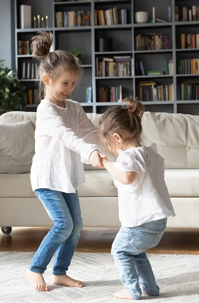 Two small girls playing